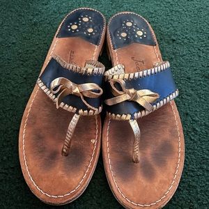 Navy blue and gold jack rogers